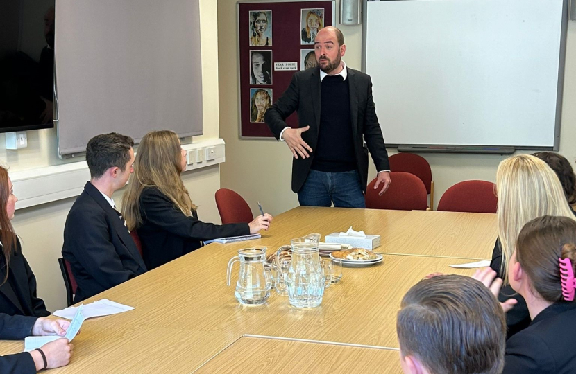 Richard speaking to school pupils